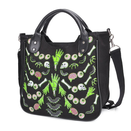 Chic spooky ghost print canvas tote bag with adjustable shoulder strap and zippered closure
