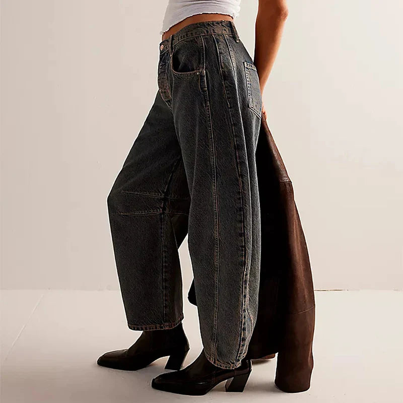 Trendha wide-leg summer pants in light blue, white, and black colors with a relaxed, stylish design