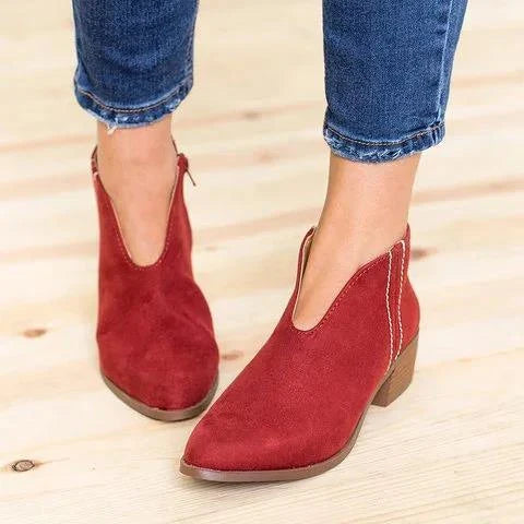 Stylish leopard print leather booties with square toe and tassel accent for fashionable women's footwear