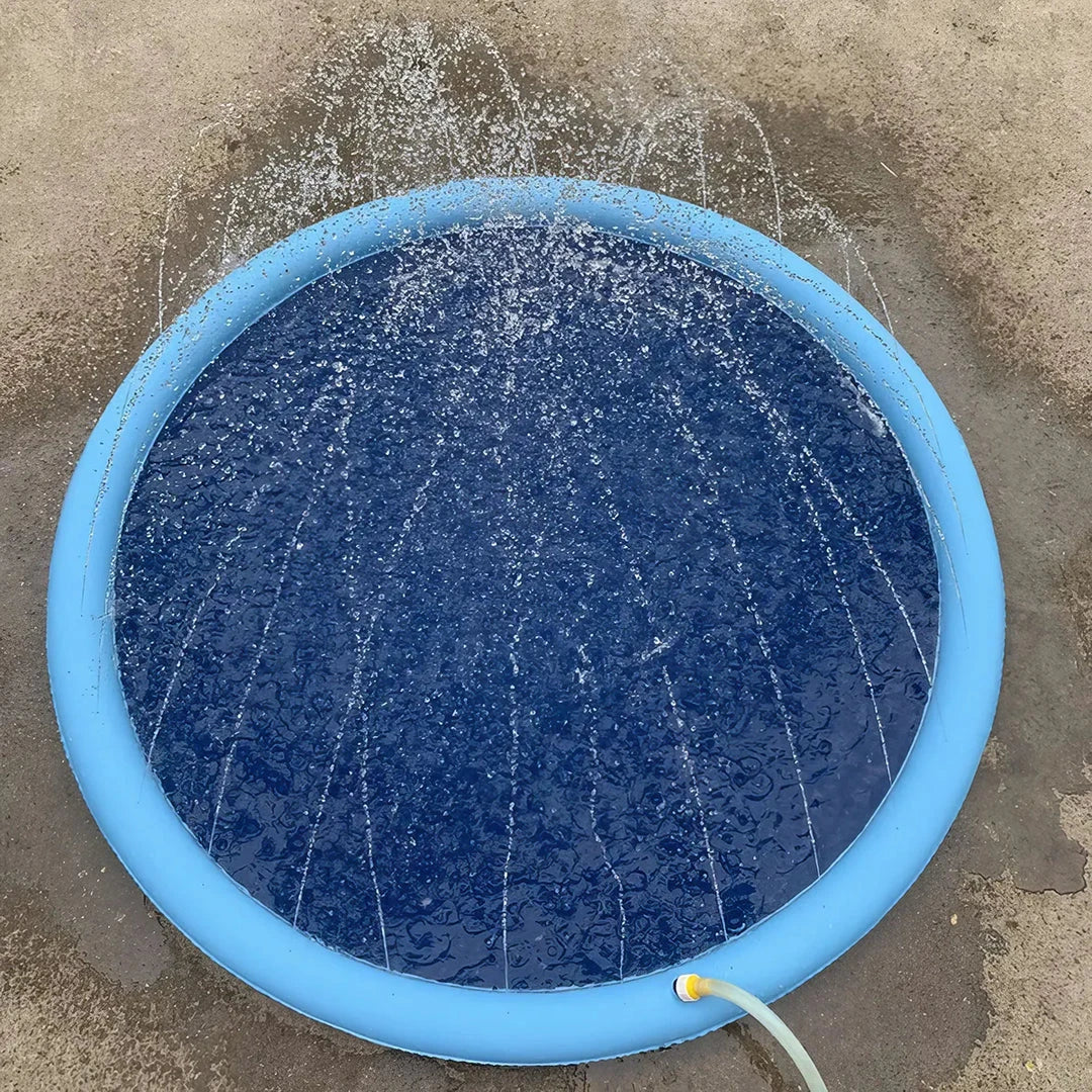 Inflatable blue dog splash pool and sprinkler mat with water jets, perfect for outdoor summer fun