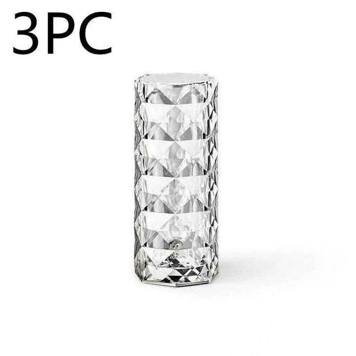 Elegant diamond-inspired crystal lamp with touch-sensitive dimming controls, providing adjustable ambient lighting for bedrooms and living spaces.