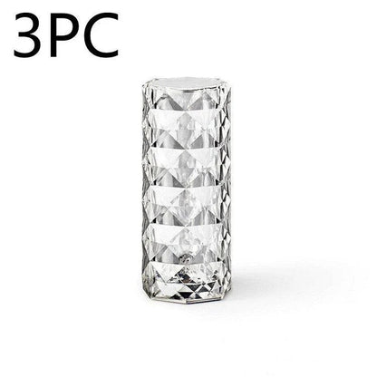 Elegant diamond-inspired crystal lamp with touch-sensitive dimming controls, providing adjustable ambient lighting for bedrooms and living spaces.