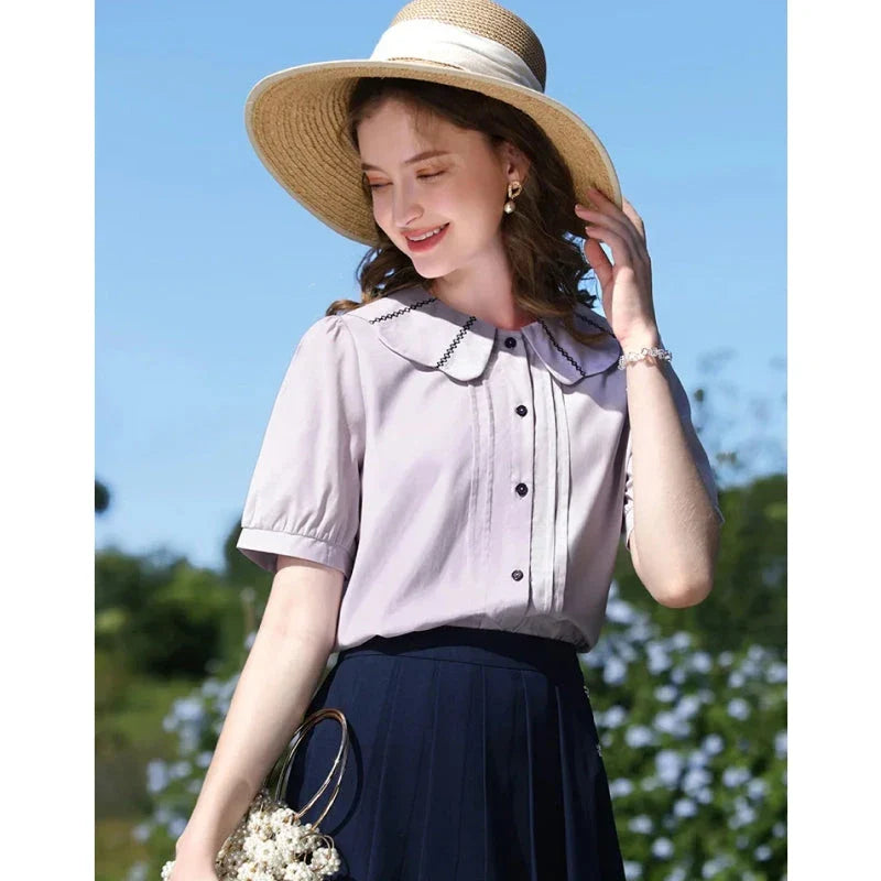 Stylish French Puff Sleeve Blouse with Classic Peter Pan Collar - A sophisticated and chic blouse for the modern, fashion-forward woman