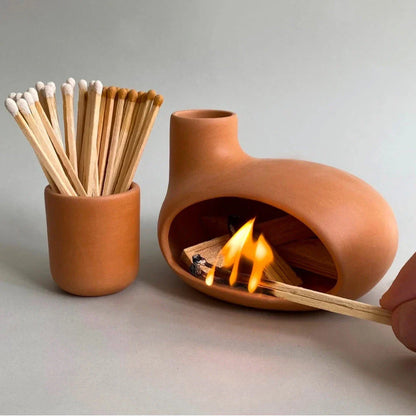 Elegant ceramic Palo Santo incense burner with a modern, conical design for optimal aroma release