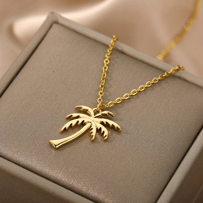 Stainless steel palm tree pendant necklace with sleek chain, perfect for summer beach style and bohemian fashion