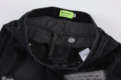 Premium loose fit distressed denim trousers for men and women, featuring a relaxed silhouette, high-quality cotton construction, and trendy distressed details.