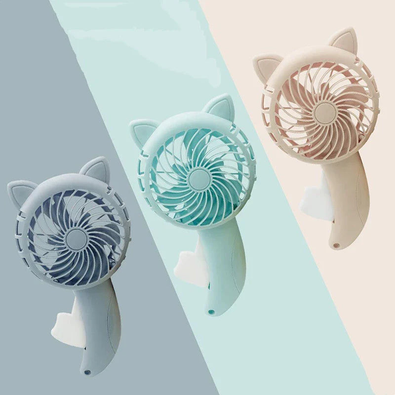 Convenient hand-held fan with a large cartoon hand design for activating the gentle breeze