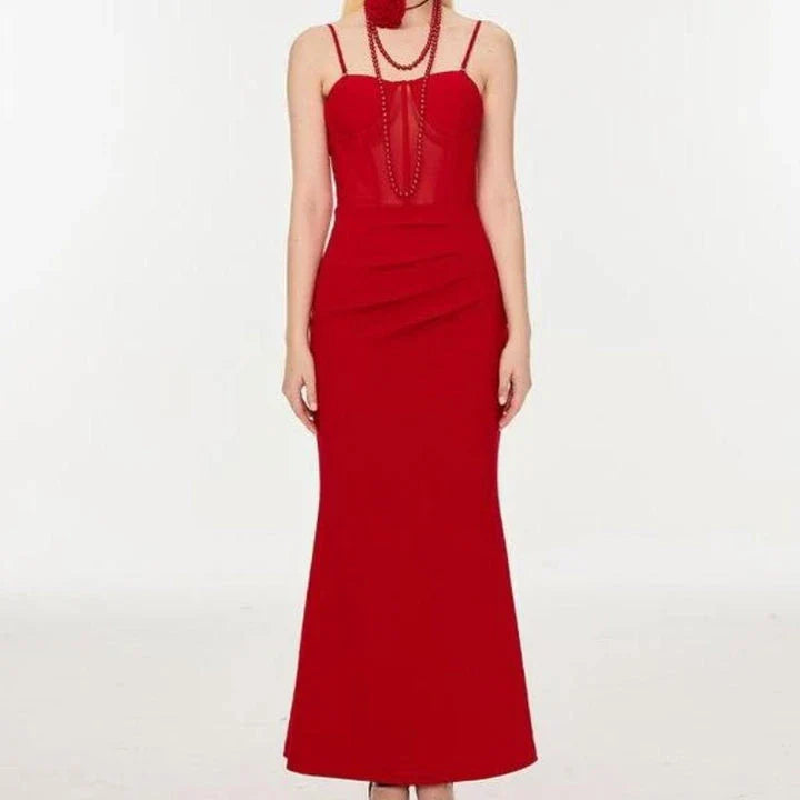 A beautiful sleeveless spaghetti strap fishtail corset dress in a luxurious fabric blend, perfect for formal occasions.