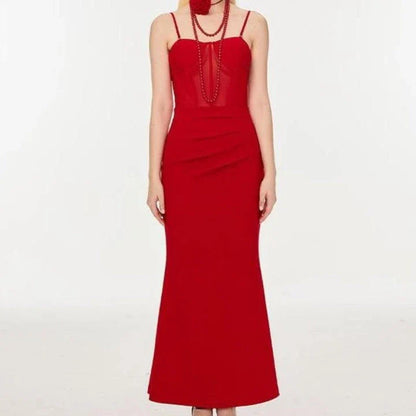 A beautiful sleeveless spaghetti strap fishtail corset dress in a luxurious fabric blend, perfect for formal occasions.