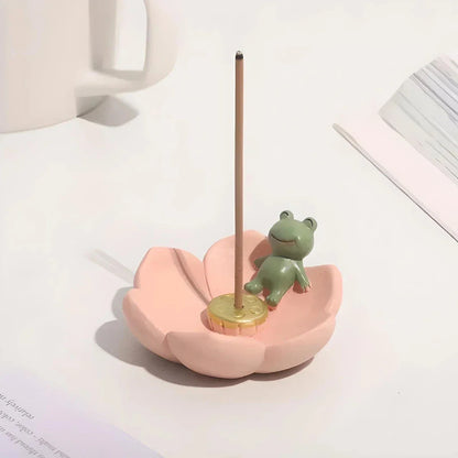 Elegant mini resin incense holder with cherry blossom, water lily, plum blossom, and daisy motifs for calming aromatherapy experience