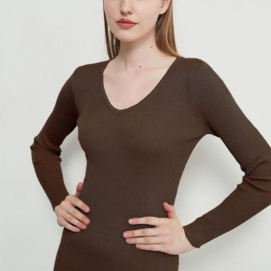 Elegant knitted midi dress in beige, black, and brown colors with lace-up details for modern sophistication