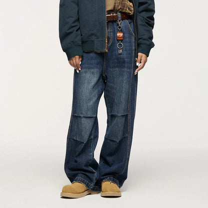 Men's relaxed fit retro straight-leg jeans in black, gray, and denim blue with vintage-inspired details