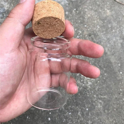 Premium glass spice jar with cork lid for organizing and storing spices, herbs, and seasonings in a modern, minimalist kitchen
