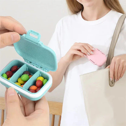 Compact, portable pill organizer with three separate compartments for organizing daily medications, vitamins, and supplements
