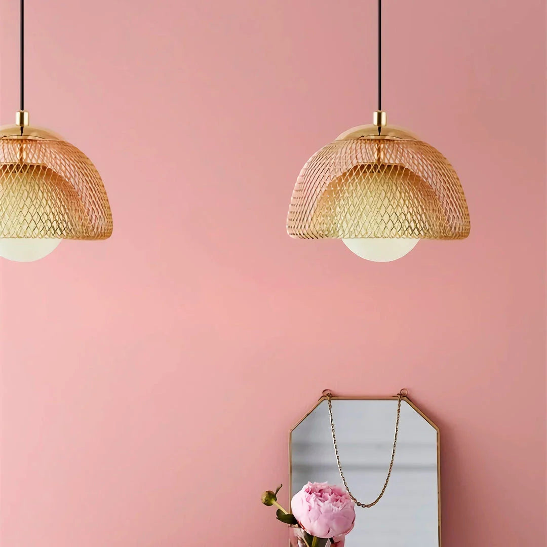 Elegant modern Nordic-style LED pendant light with polished copper finish and gold lampshade, providing focused and effective illumination for living spaces.