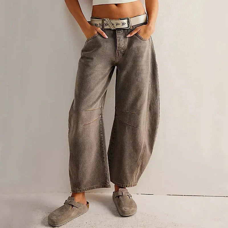 Trendha wide-leg summer pants in light blue, white, and black colors with a relaxed, stylish design