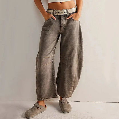 Trendha wide-leg summer pants in light blue, white, and black colors with a relaxed, stylish design