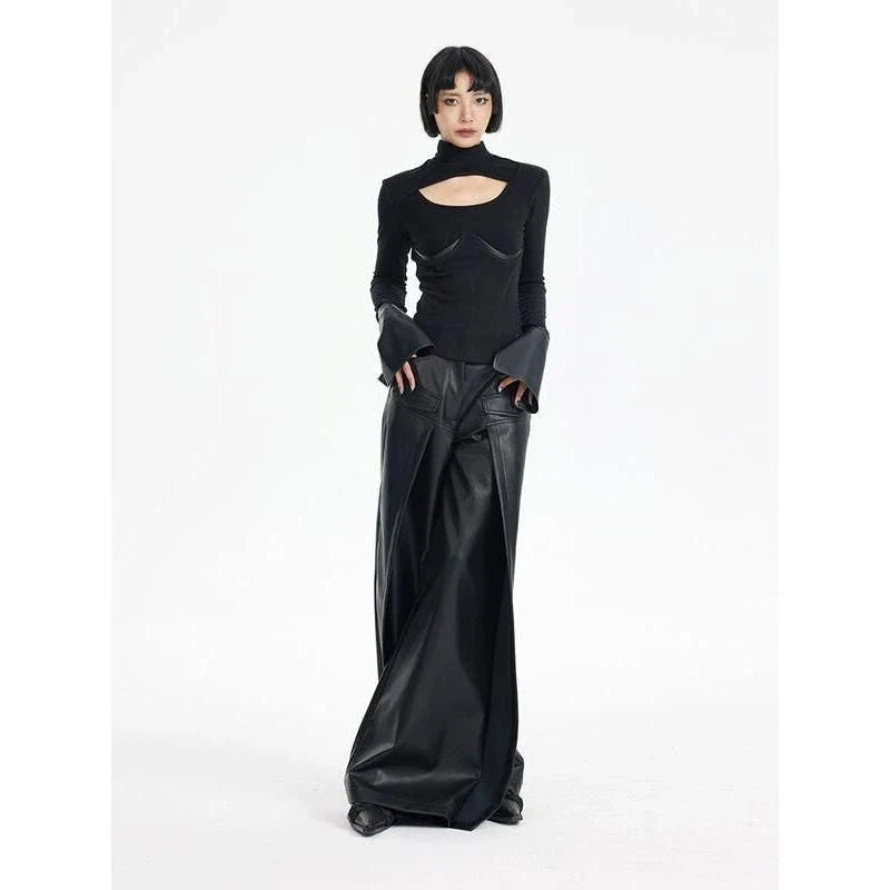 Stylish knit pullover with PU leather patchwork detail, offering a cozy and fashionable winter essential
