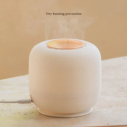 300ML USB Aromatherapy Diffuser with Soothing Night Light - Elevate your space with this compact, yet powerful diffuser that delivers calming aromatherapy mist and a soft night light.