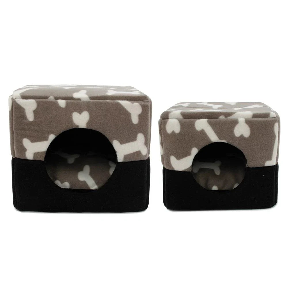 A plush, white pet bed with a stylish paw print design, providing a cozy and comfortable resting space for dogs or cats.