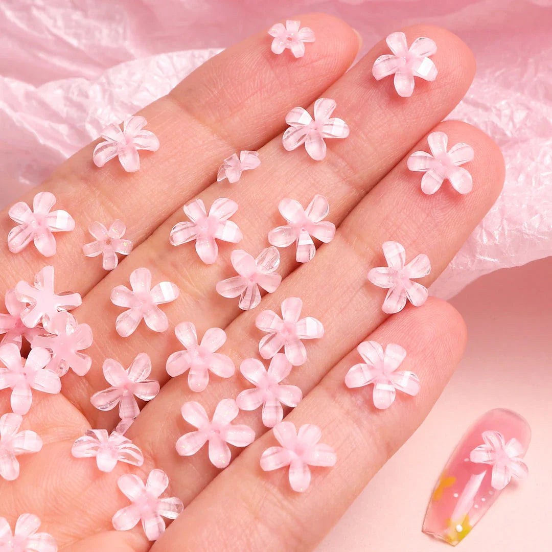 Transparent jelly 3D flower nail charms with rhinestone accents for elegant and charming nail art designs