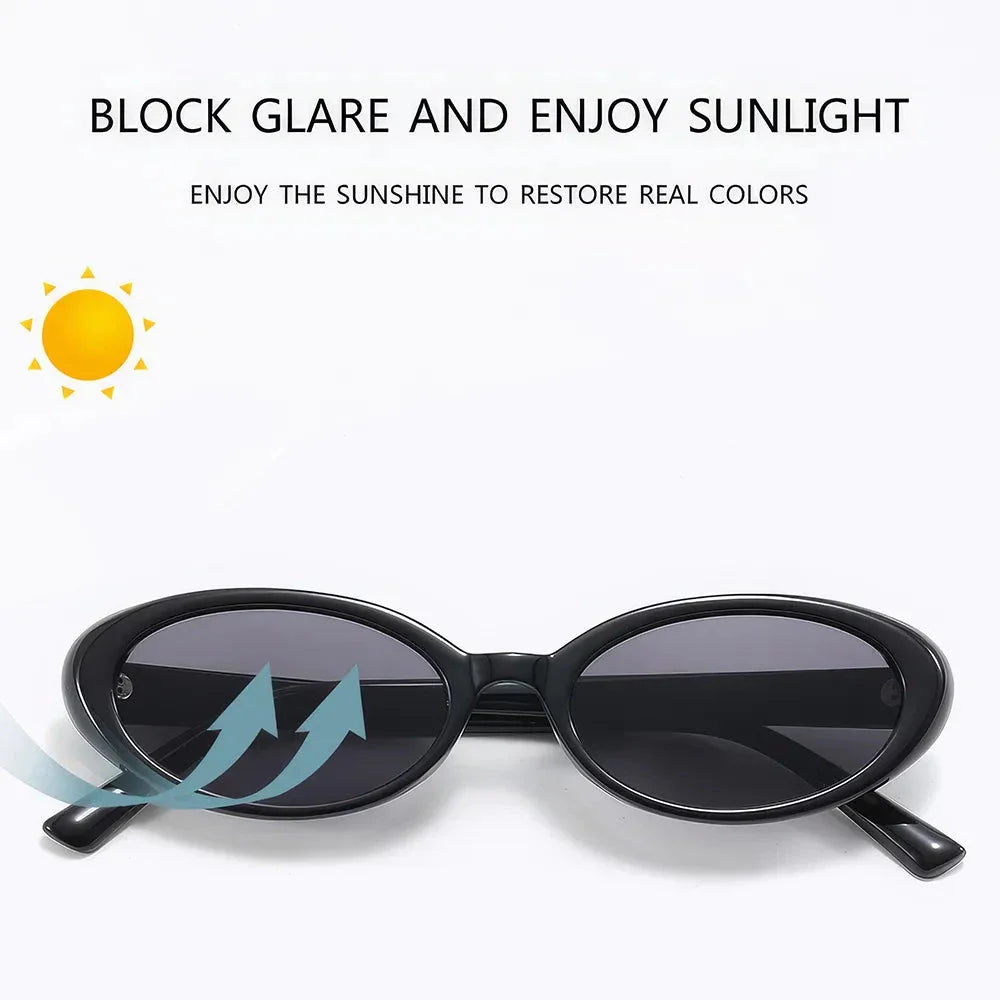 Chic oval sunglasses with white grey acetate frames and polycarbonate lenses, designed for fashionable women to shield their eyes from UV rays in style.