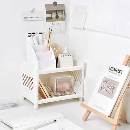 Sleek white desktop organizer with two-tier storage compartments for keeping office supplies, cosmetics, and other essentials neatly organized on a desk or countertop