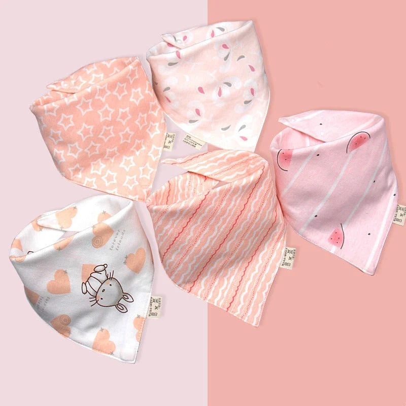 Fashionable cotton baby bandana bibs in various prints, with waterproof backing and adjustable design