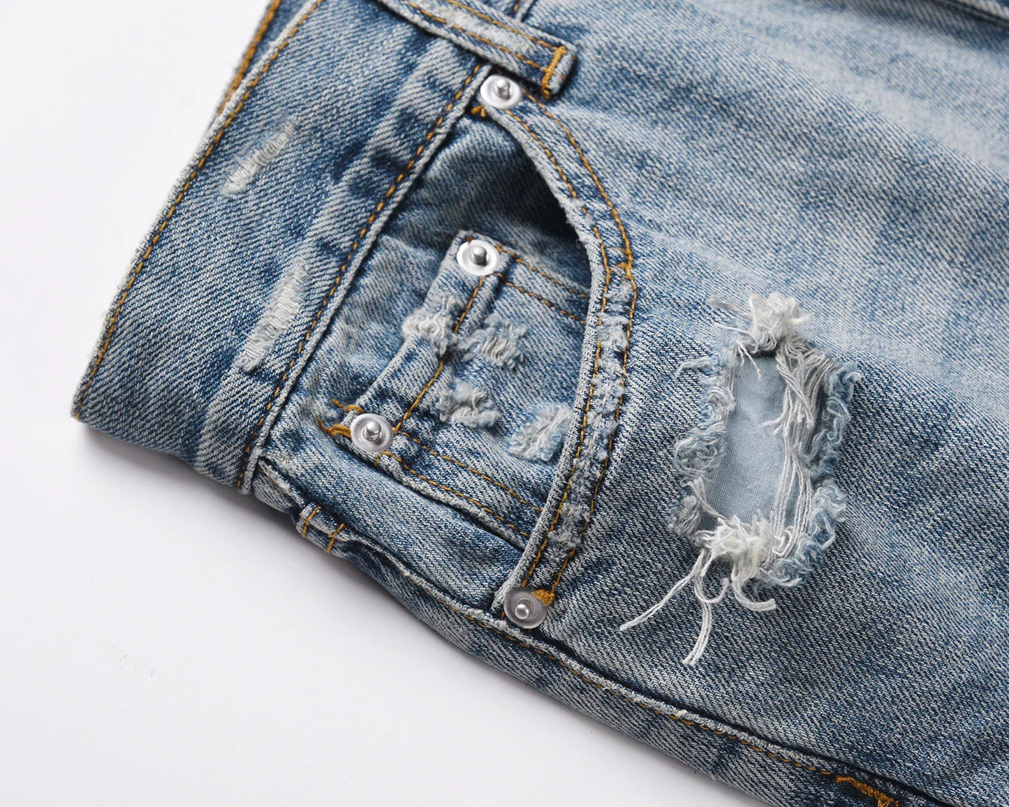 Premium distressed denim jeans with ripped detailing, perfect for casual streetwear style