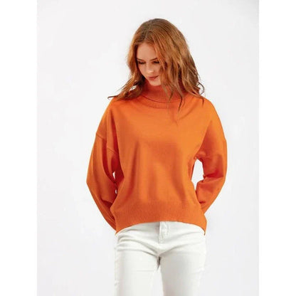Chic and cozy oversized turtleneck sweater for women in a solid color, perfect for cold weather fashion and style
