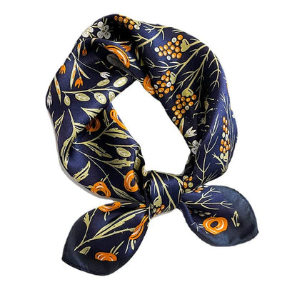 Floral print silk scarf in navy color, a versatile accessory for effortless style