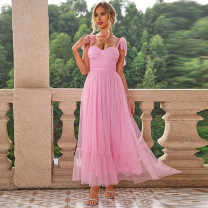 Fairy-inspired dress with mid-length silhouette, lace-up details, and luxurious polyester fabric