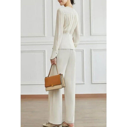 Elegant long sleeve top and wide leg pants set in solid color for stylish autumn wear