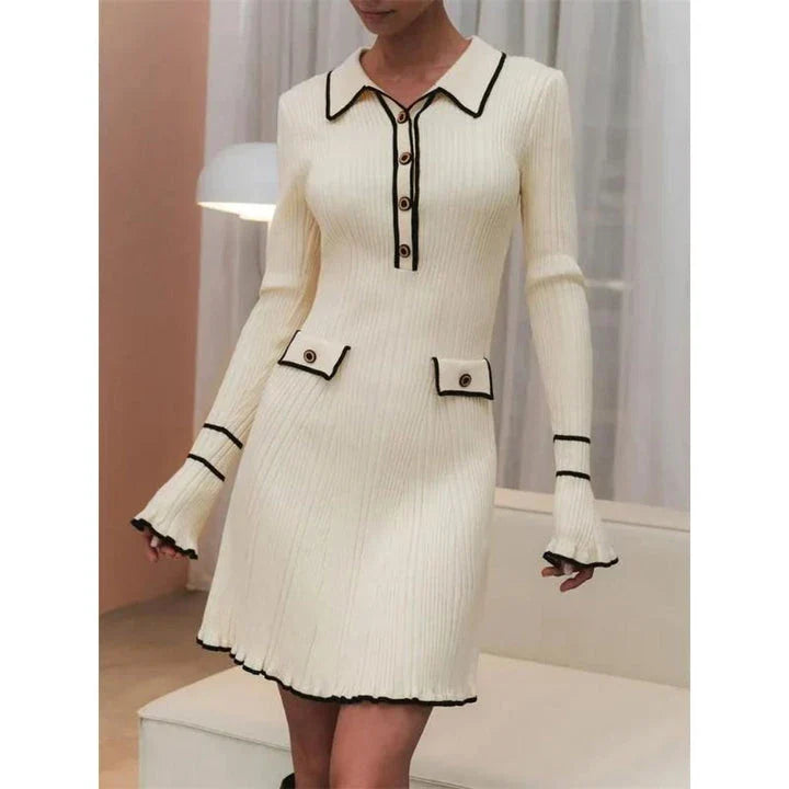 Elegant ruffled knit mini dress in black with high stretch fabric and patchwork pattern for a sophisticated and comfortable look