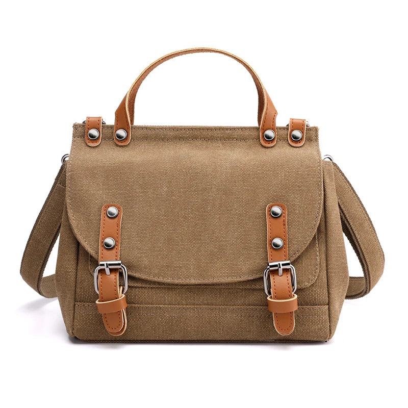A stylish women's canvas crossbody handbag in an orange color, featuring a small square shape and a horizontal design.