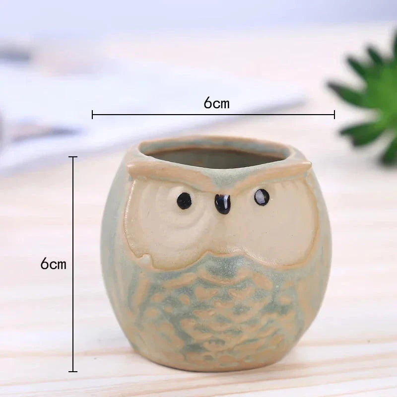 Adorable mini owl-shaped ceramic planter for small plants and succulents, featuring vibrant colors and vintage charm