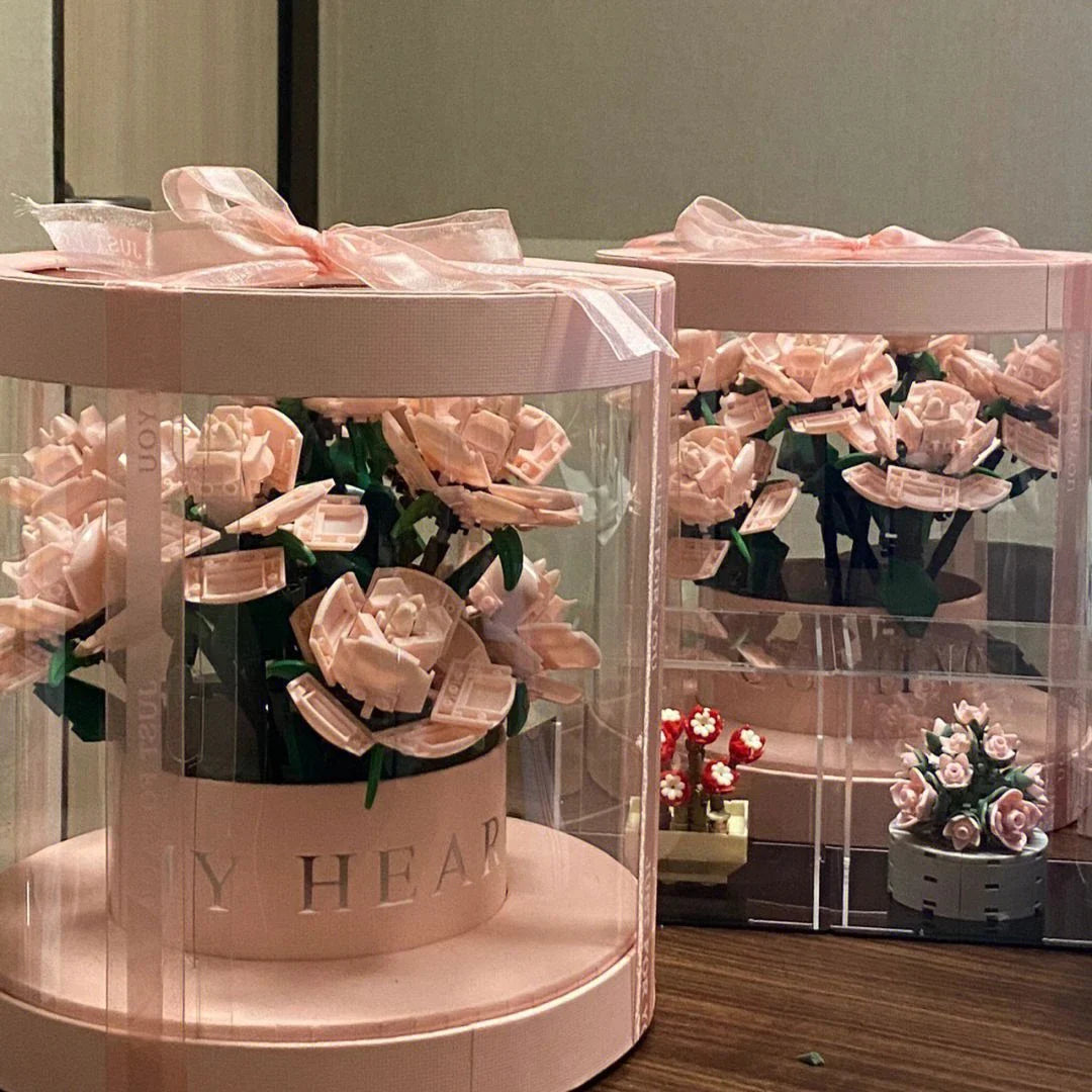 A decorative flower pot featuring a stunning rose bouquet design, made of high-quality plastic for indoor or outdoor use.