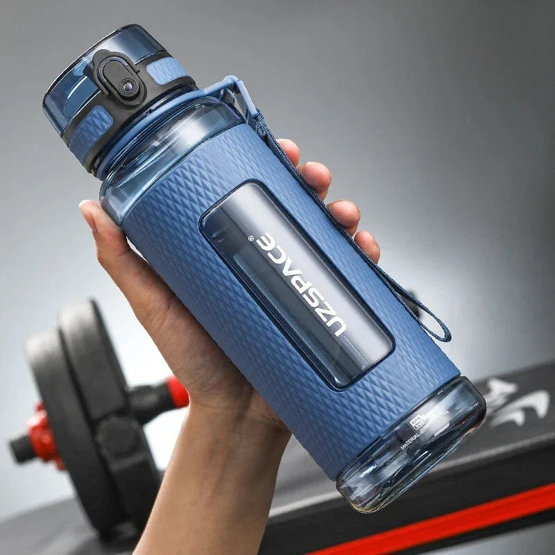 Portable sports water bottle with wide mouth, tea infuser, and leak-proof design for active lifestyles