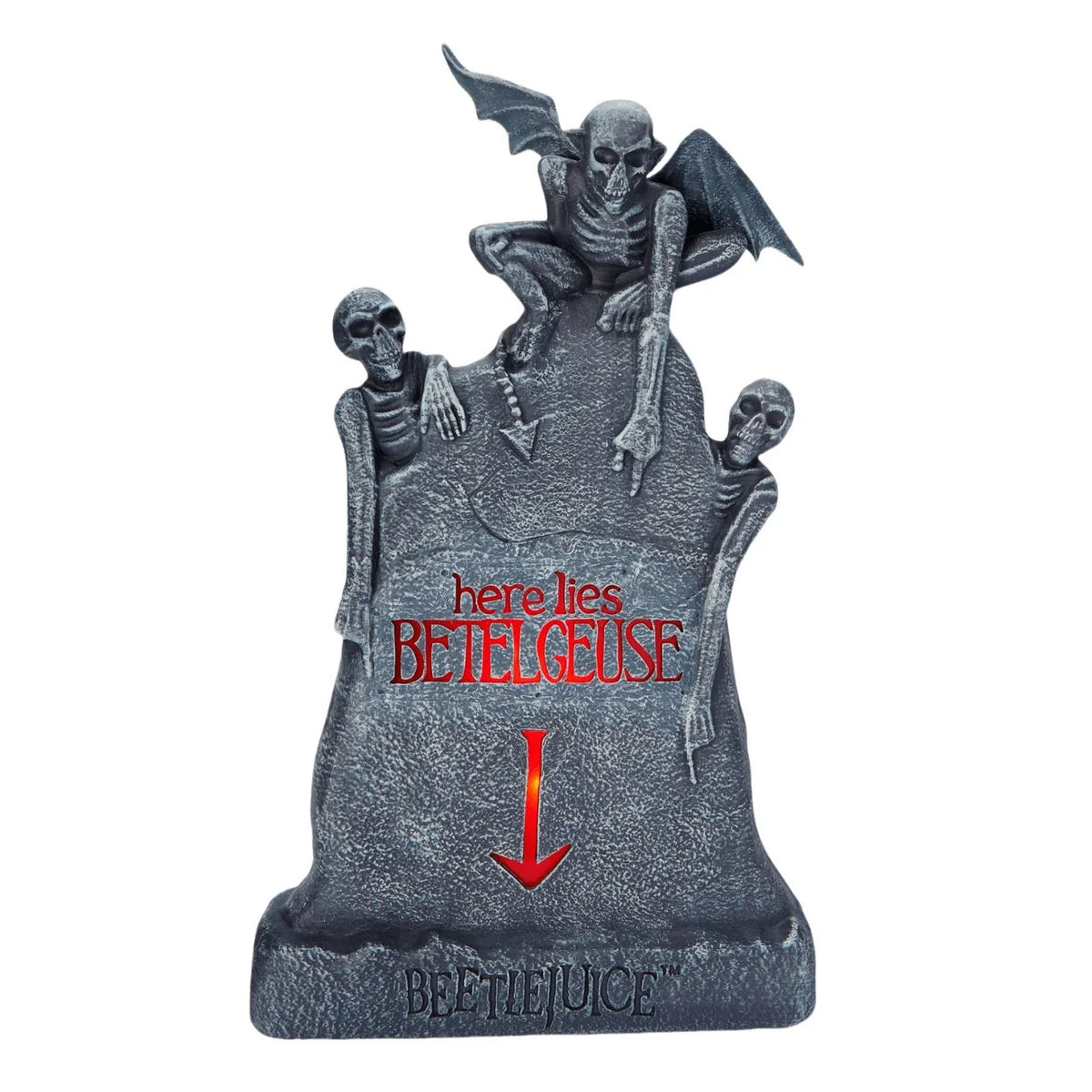 Glowing ghost skull tombstone decor with a spooky, otherworldly glow for Halloween