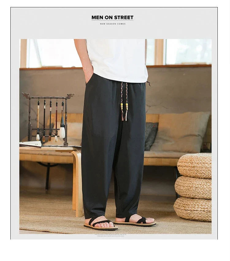 Men's Chinese-inspired harem pants made of luxurious ice silk fabric with a relaxed, draped silhouette