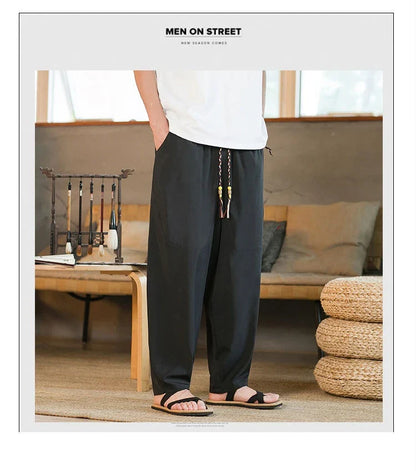 Men's Chinese-inspired harem pants made of luxurious ice silk fabric with a relaxed, draped silhouette