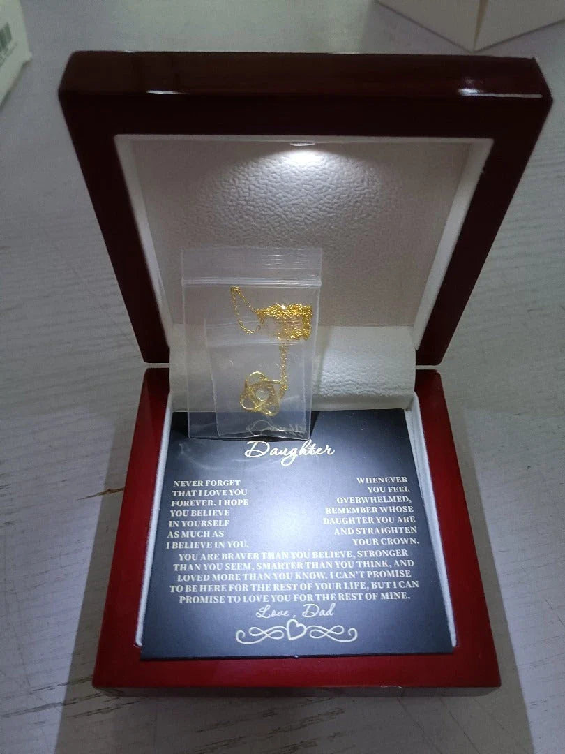 A dazzling diamond-accented star pendant necklace made of 925 sterling silver with a delicate clavicle chain, making a thoughtful holiday gift for her.