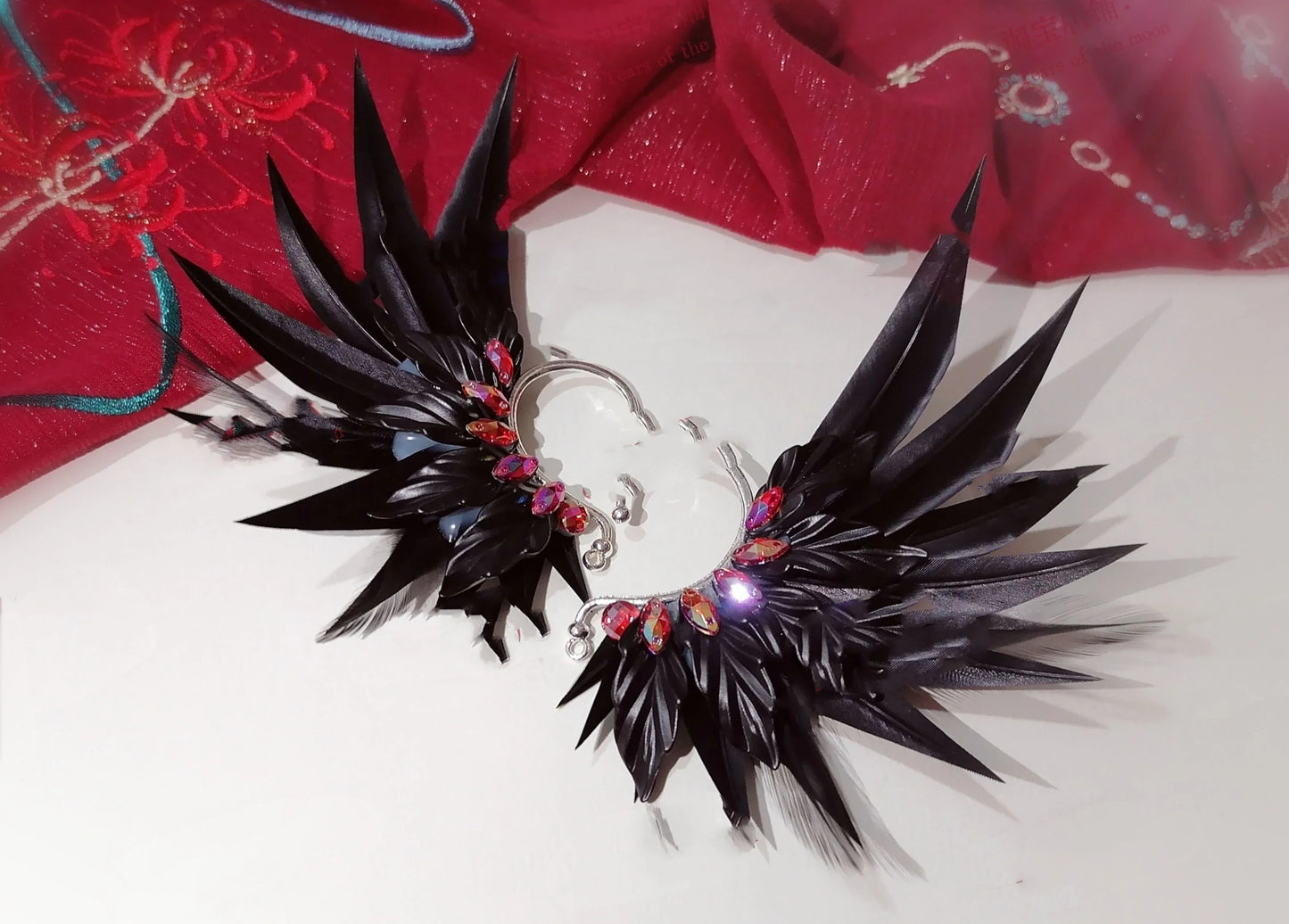Elegant feather earrings with delicate angel wing design in various color options