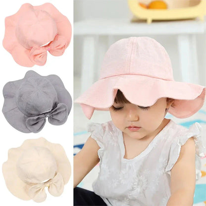 Adorable princess-inspired baby bucket hat with soft cotton material and wide brim for sun protection