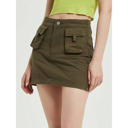Chic green denim high-waist pencil skirt with convenient pockets, offering a flattering and versatile look for any occasion.