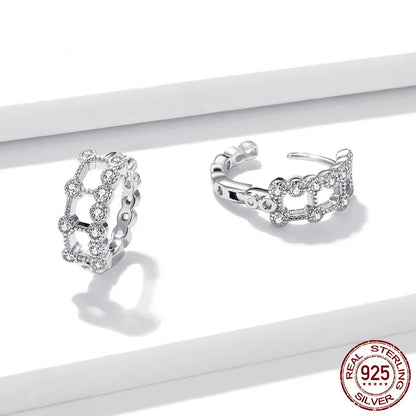 Elegant double-layered electroplated silver earrings with a minimalist, sophisticated design