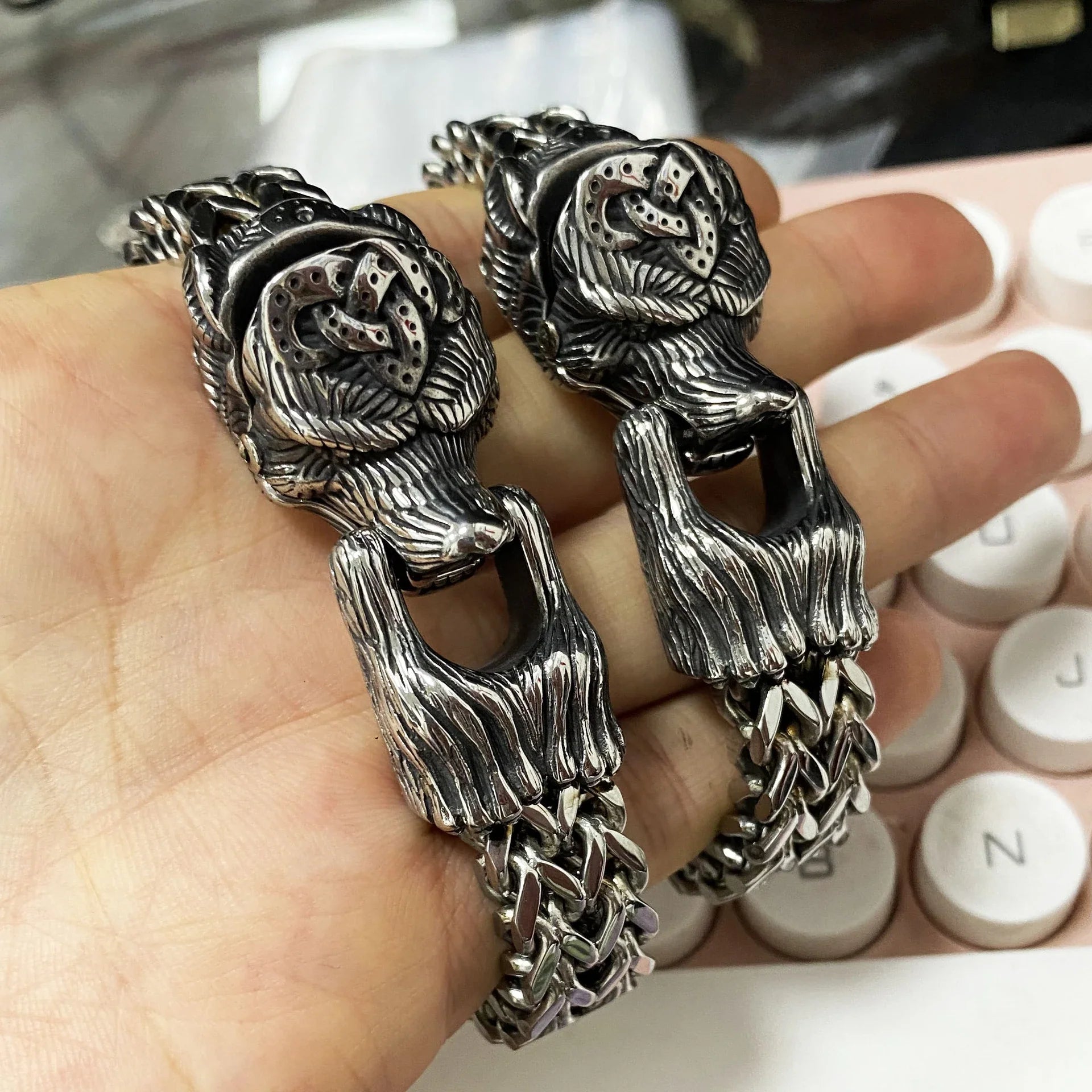 Titanium steel Viking-inspired bracelet with a polished finish and bear design, perfect for modern men seeking a bold, retro-punk accessory.