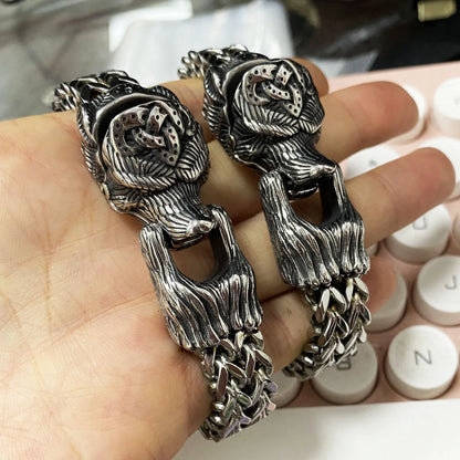 Titanium steel Viking-inspired bracelet with a polished finish and bear design, perfect for modern men seeking a bold, retro-punk accessory.