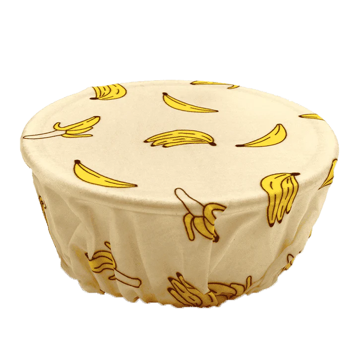 Reusable beeswax food wrap film in a variety of floral patterns, including yellow, green, beige, and white