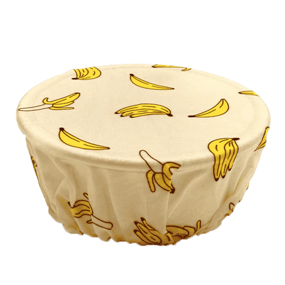 Reusable beeswax food wrap film in a variety of floral patterns, including yellow, green, beige, and white